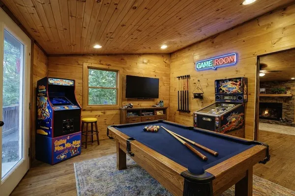 a room with furniture and flat screen tv