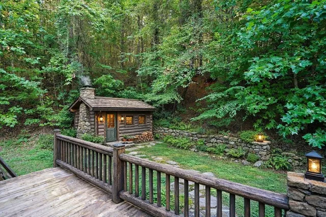 a bathroom with a sink mirror and a bathtub