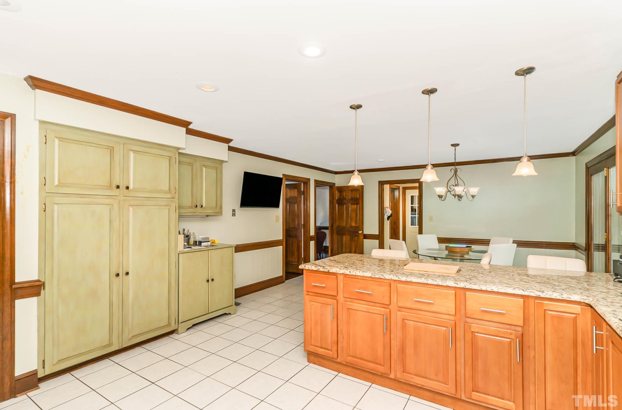 8700 Stage Ford Road Raleigh, NC 27615 - Photo 15 of 25 a spacious bathroom with a granite countertop sink mirror and