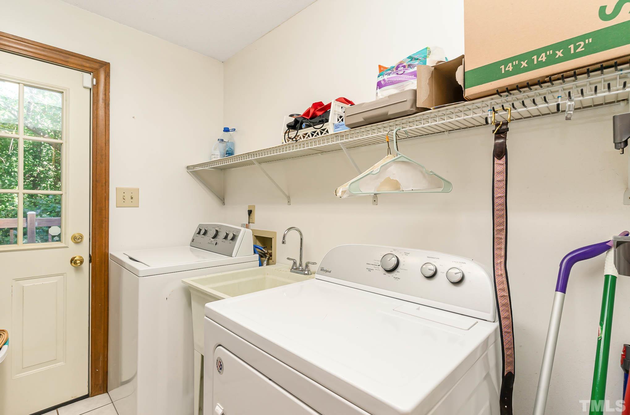 8700 Stage Ford Road Raleigh, NC 27615 - Photo 18 of 25 a utility room with dryer and washer