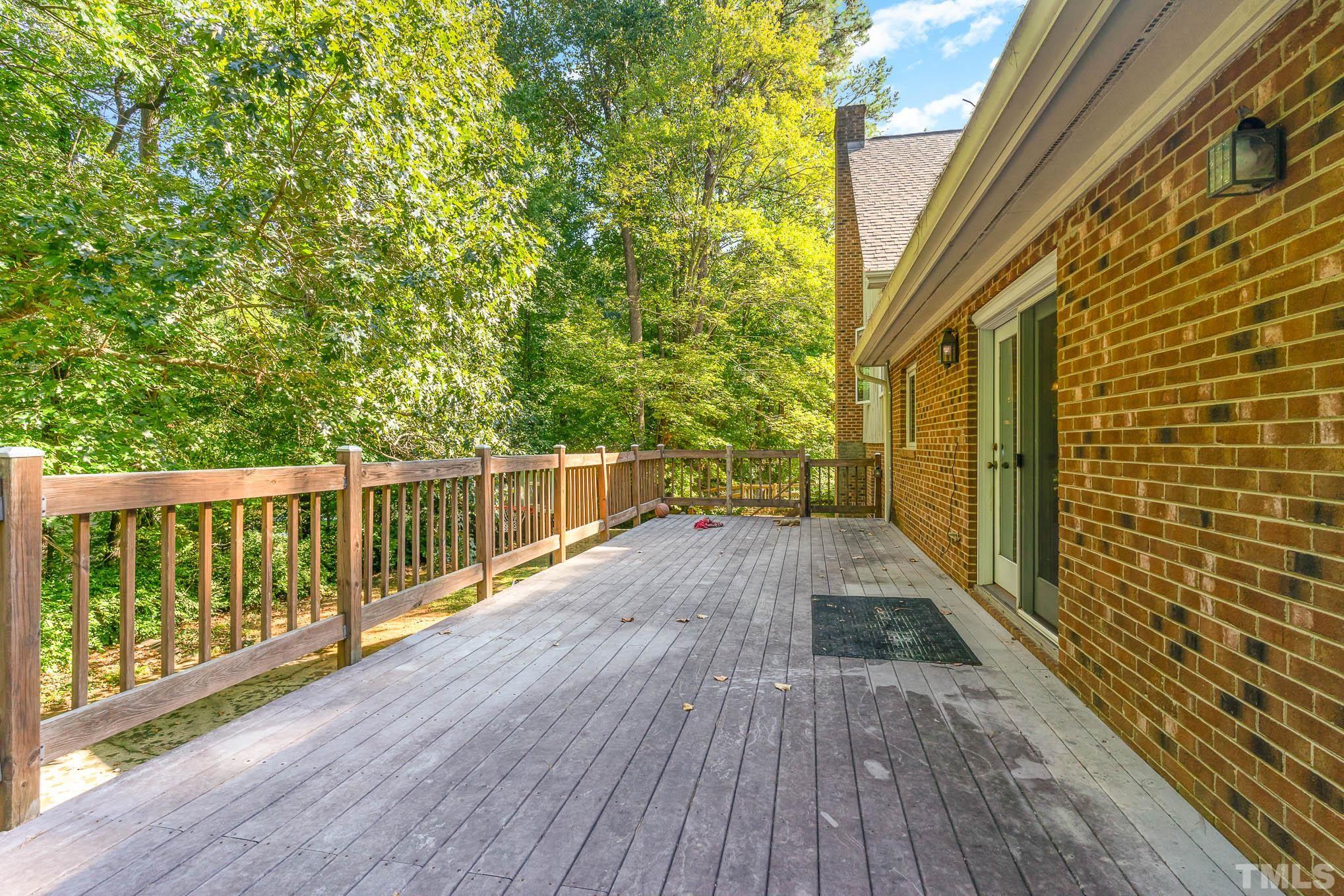 8700 Stage Ford Road Raleigh, NC 27615 - Photo 21 of 25 a view of balcony with wooden floor