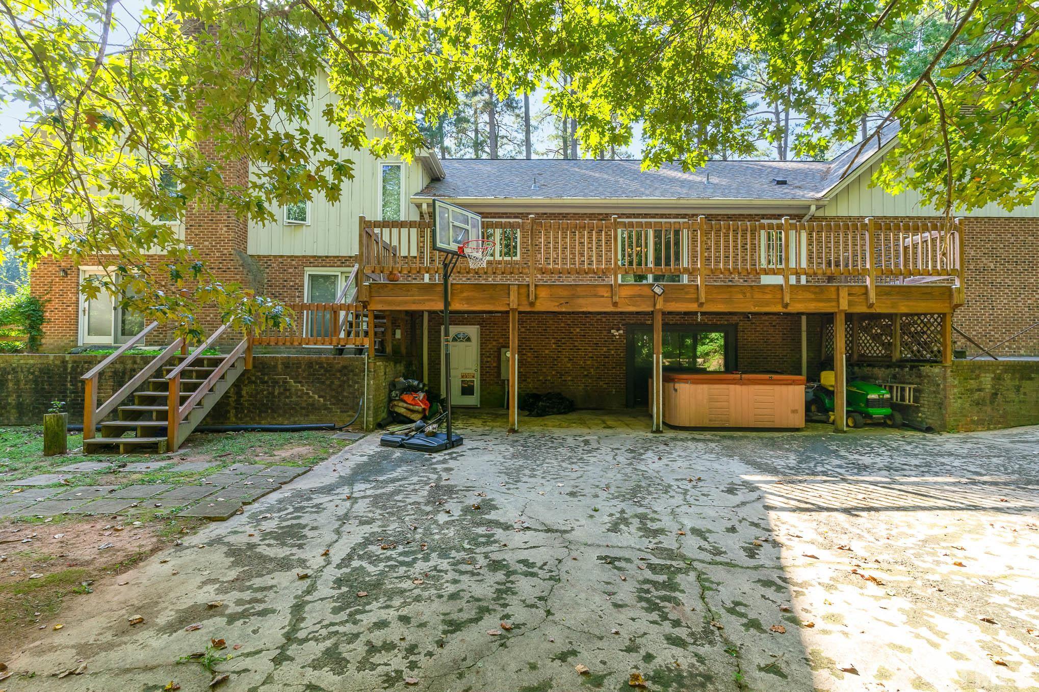 8700 Stage Ford Road Raleigh, NC 27615 - Photo 23 of 25 a view of a house with a yard