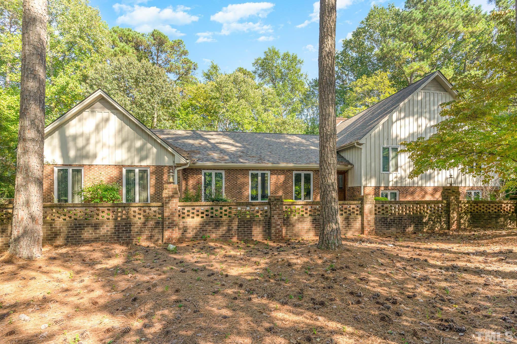 8700 Stage Ford Road Raleigh, NC 27615 - Photo 24 of 25 a view of a house with a yard