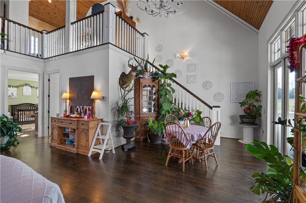 31 Duck Pond Road Roopville, GA 30170 - Photo 106 of 136 a view of a dining room with furniture and wooden floor
