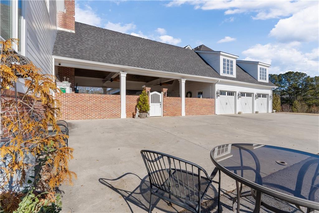 31 Duck Pond Road Roopville, GA 30170 - Photo 11 of 136 a view of a house with backyard and sitting area