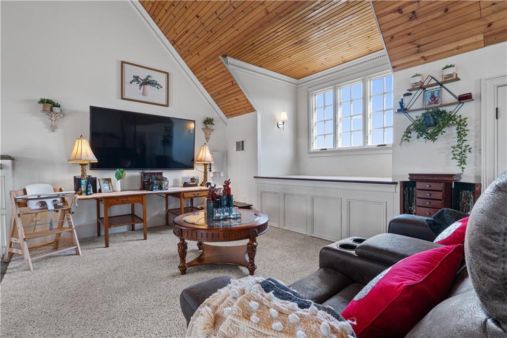 31 Duck Pond Road Roopville, GA 30170 - Photo 119 of 136 a living room with furniture and a flat screen tv
