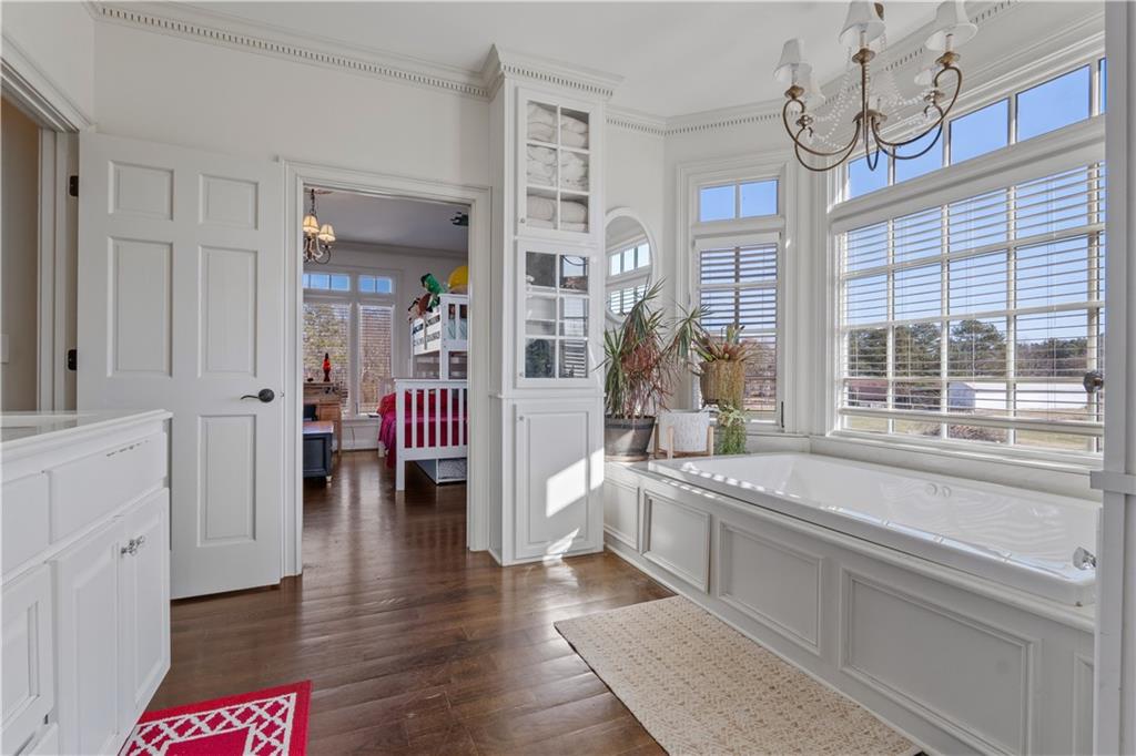 31 Duck Pond Road Roopville, GA 30170 - Photo 127 of 136 a very nice looking room with a large window and wooden floor