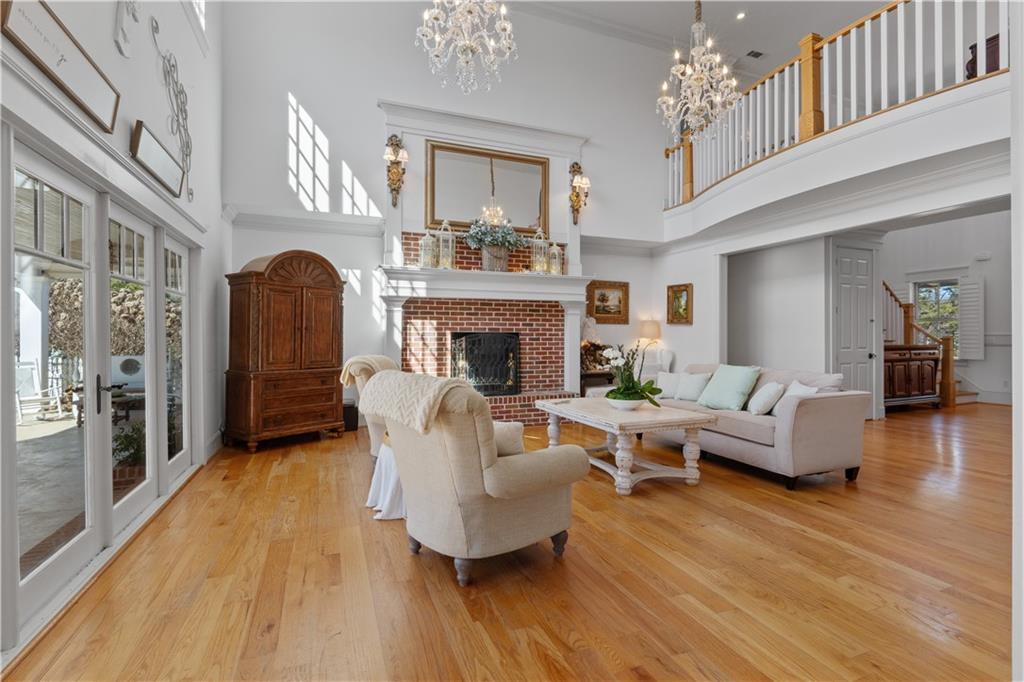 31 Duck Pond Road Roopville, GA 30170 - Photo 40 of 136 a living room with furniture and a fireplace