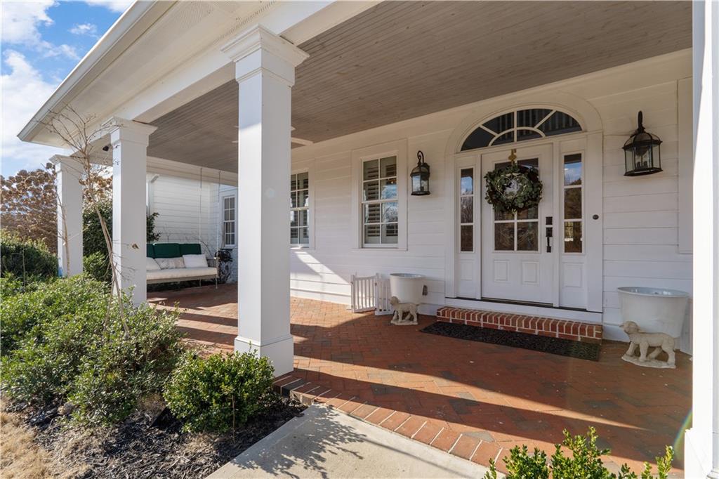 31 Duck Pond Road Roopville, GA 30170 - Photo 5 of 136 a front view of a house with a yard