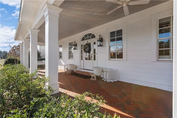 a front view of a house with outdoor space