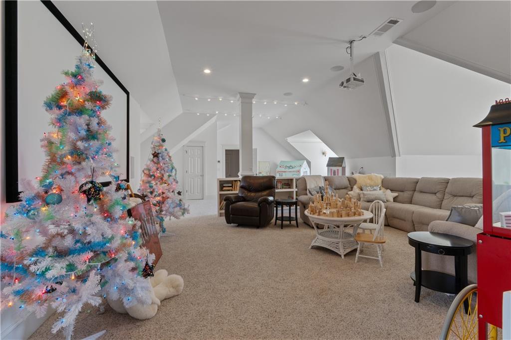 31 Duck Pond Road Roopville, GA 30170 - Photo 85 of 136 a living room with furniture and flowers