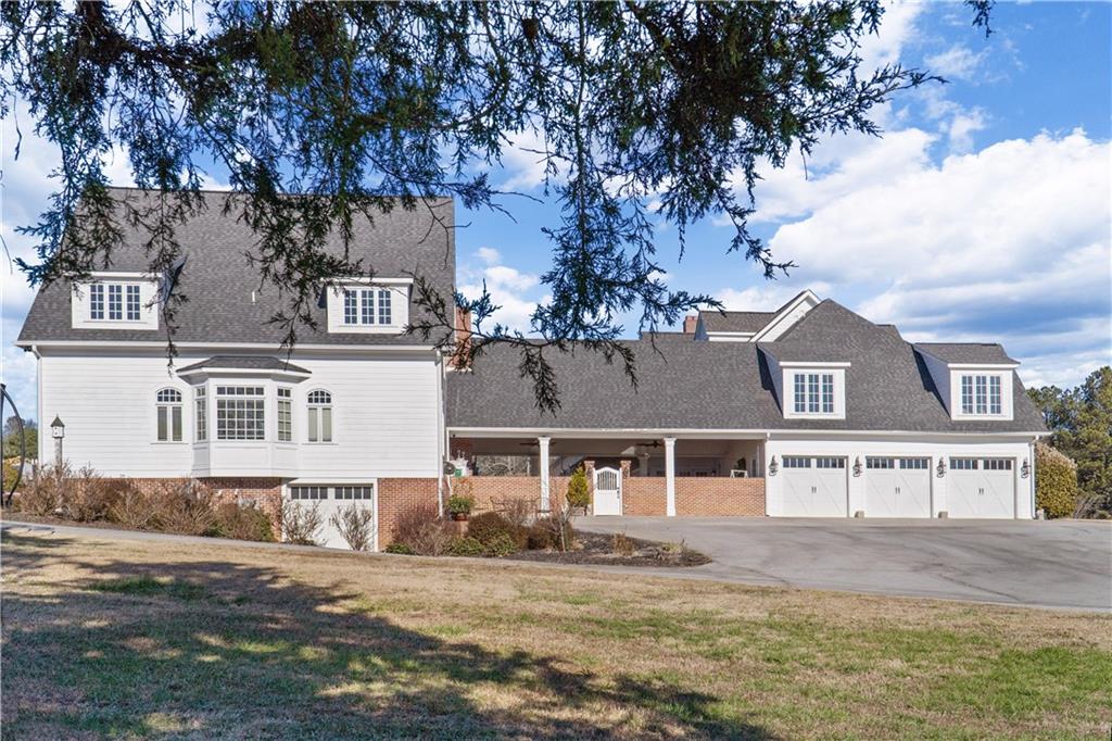 31 Duck Pond Road Roopville, GA 30170 - Photo 9 of 136 front view of a house with a yard