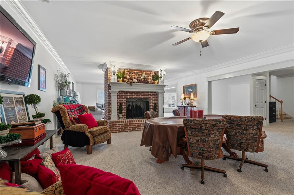 31 Duck Pond Road Roopville, GA 30170 - Photo 92 of 136 a living room with furniture and a fireplace