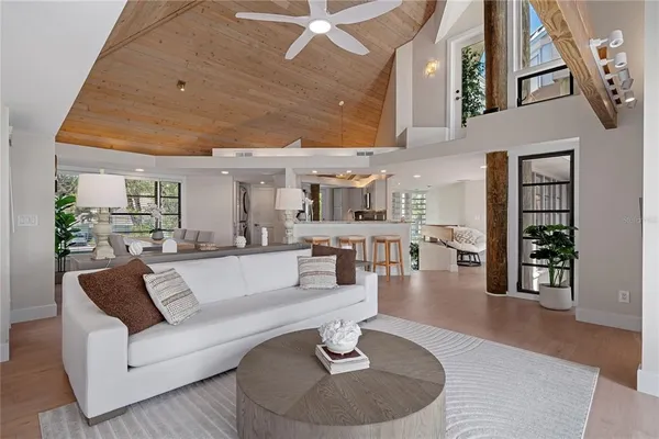 a kitchen with stainless steel appliances granite countertop a stove a refrigerator and a sink
