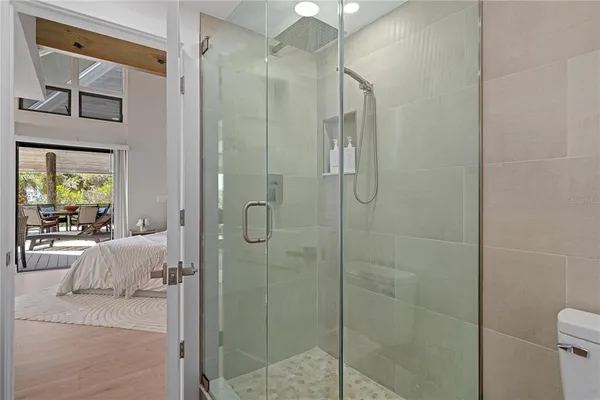 a view of utility room with a fan