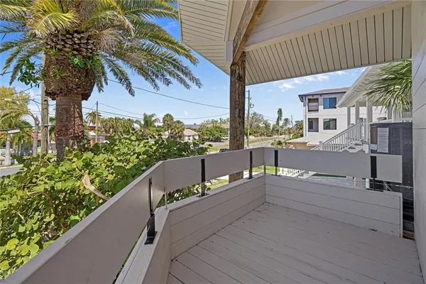 a view of a couches in patio of a house