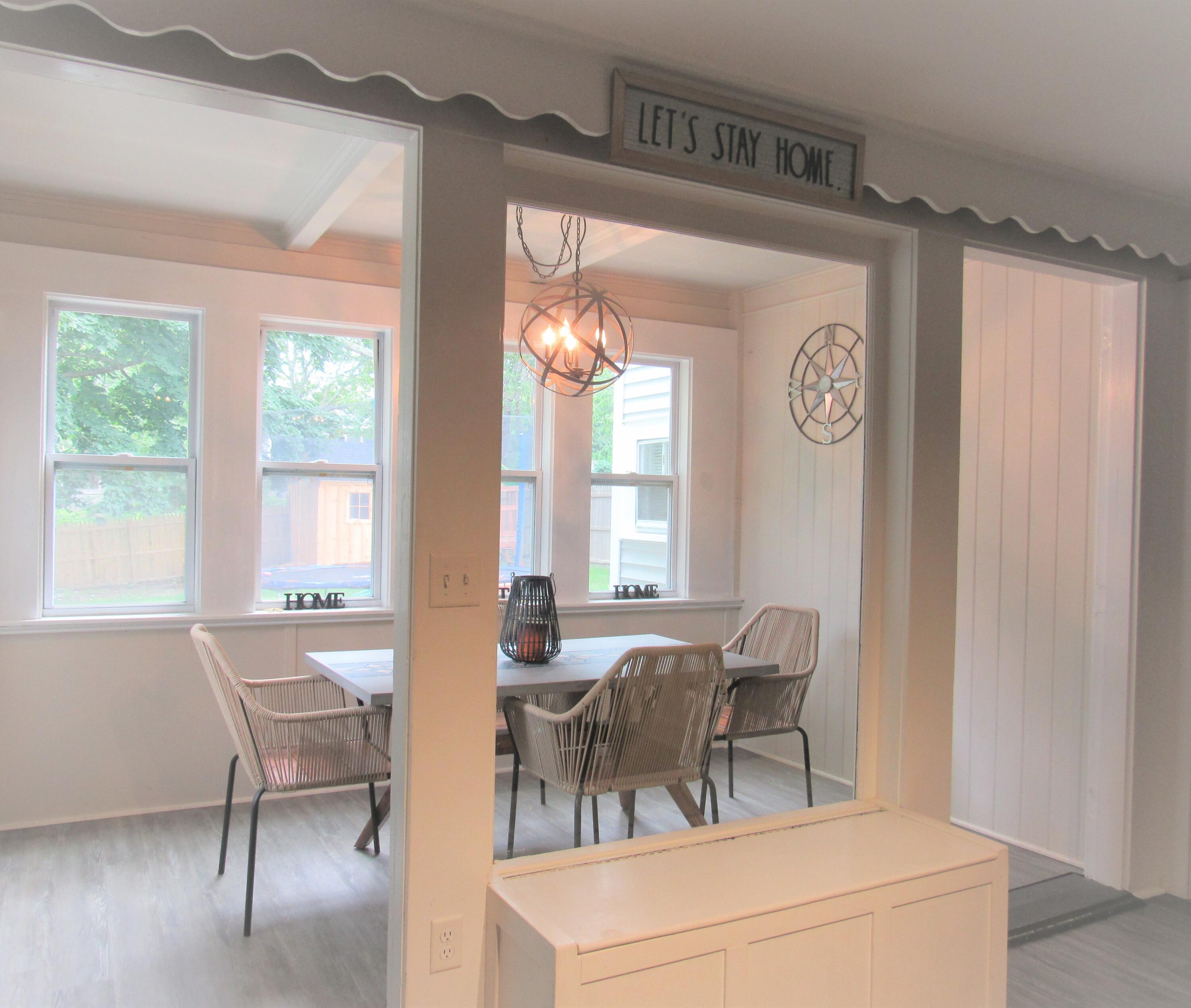 103 Baxter Road Hyannis, MA 02601 - Photo 12 of 31 a view of a dining room with furniture and a large window