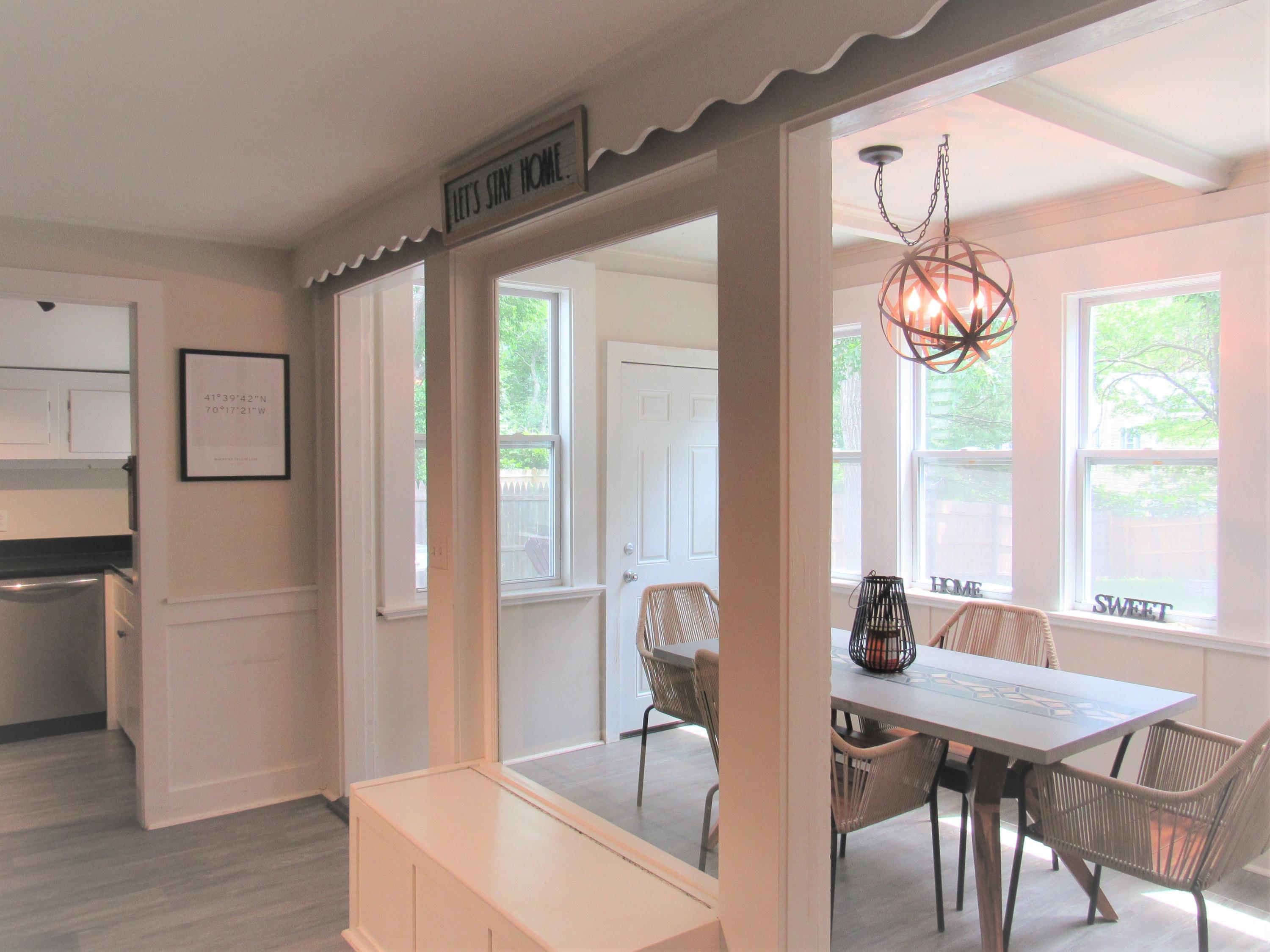 103 Baxter Road Hyannis, MA 02601 - Photo 13 of 31 a view of a dining room with furniture window and outside view