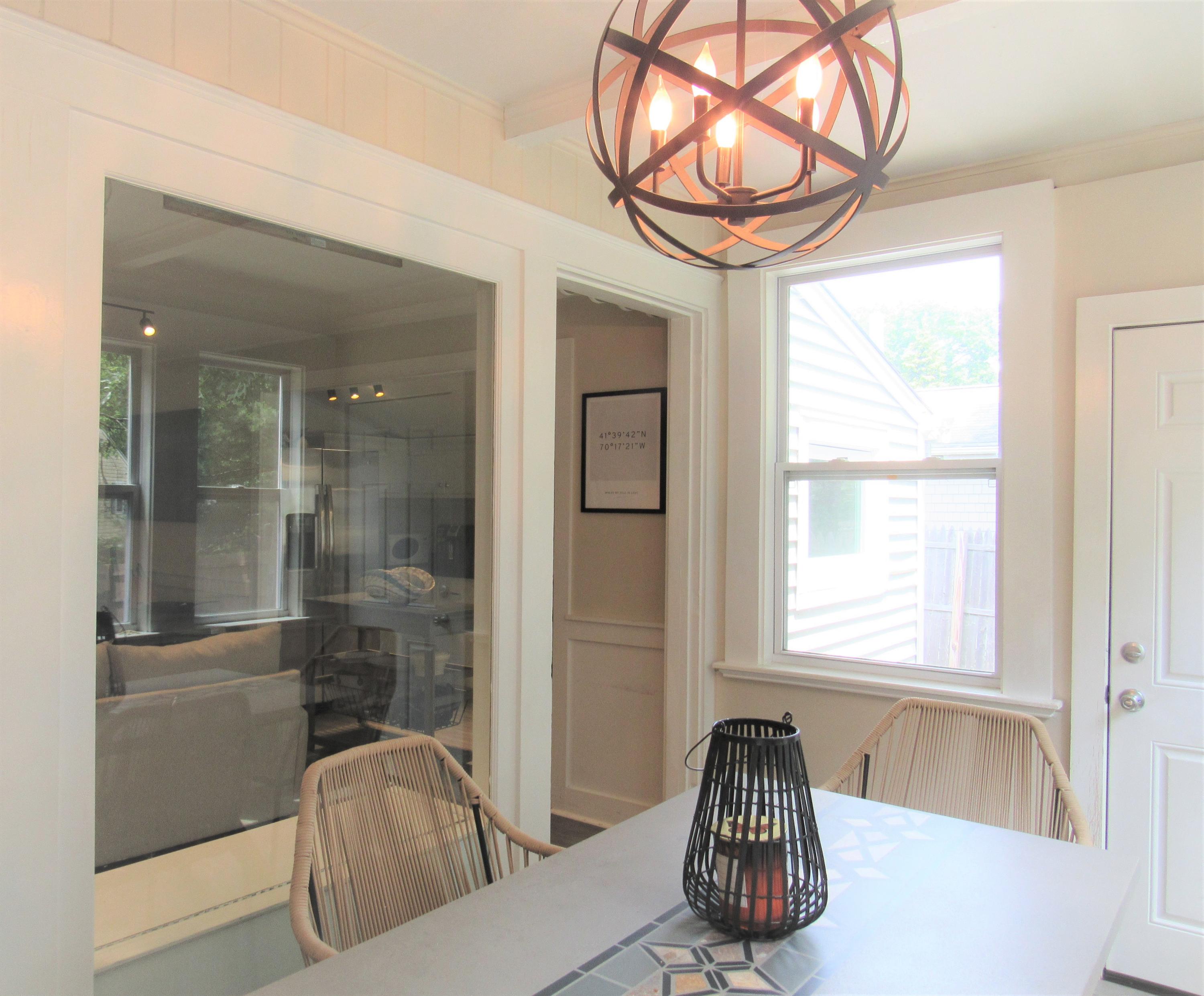 103 Baxter Road Hyannis, MA 02601 - Photo 14 of 31 a living room with furniture and a window