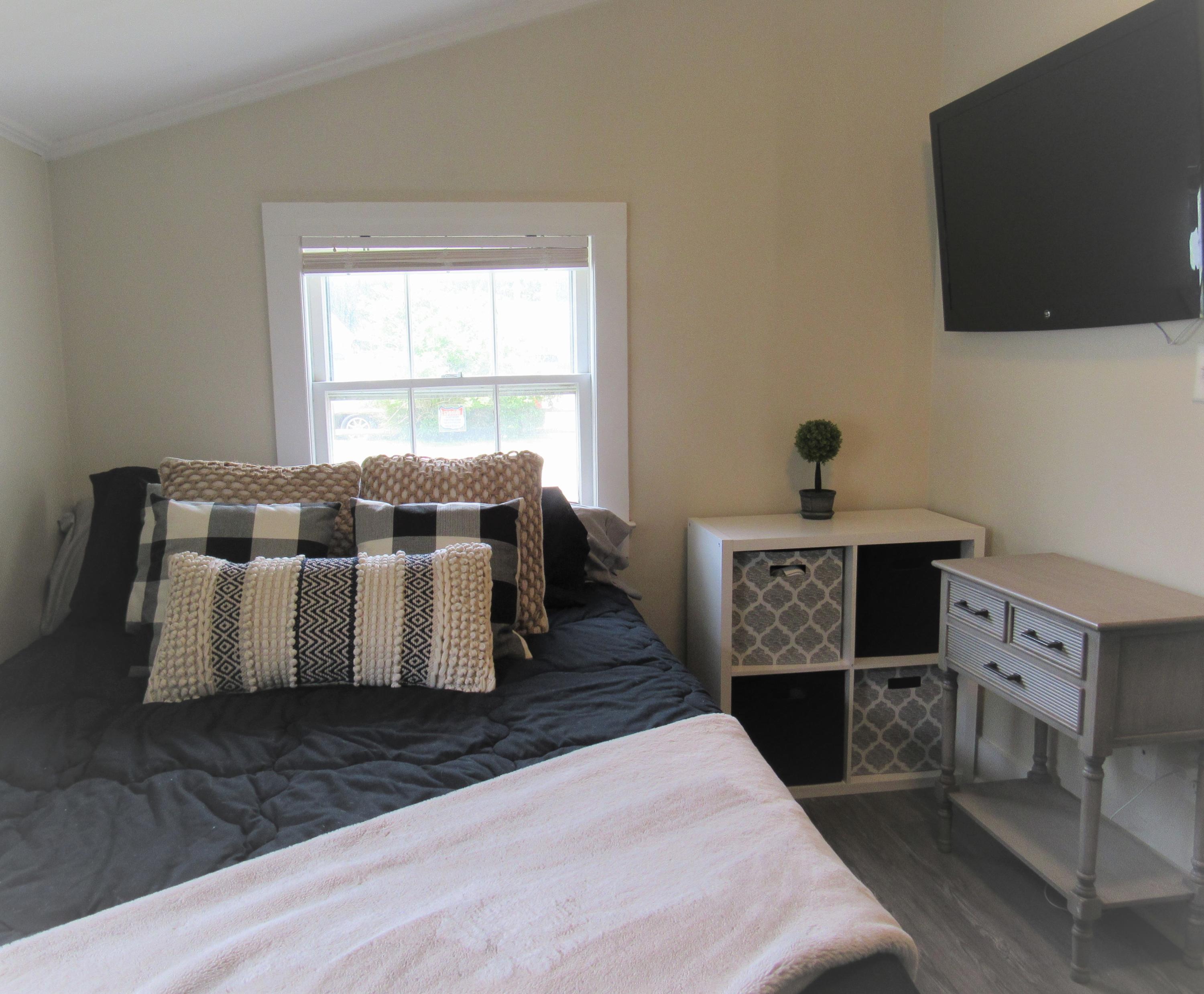 103 Baxter Road Hyannis, MA 02601 - Photo 17 of 31 a living room with furniture and a flat screen tv