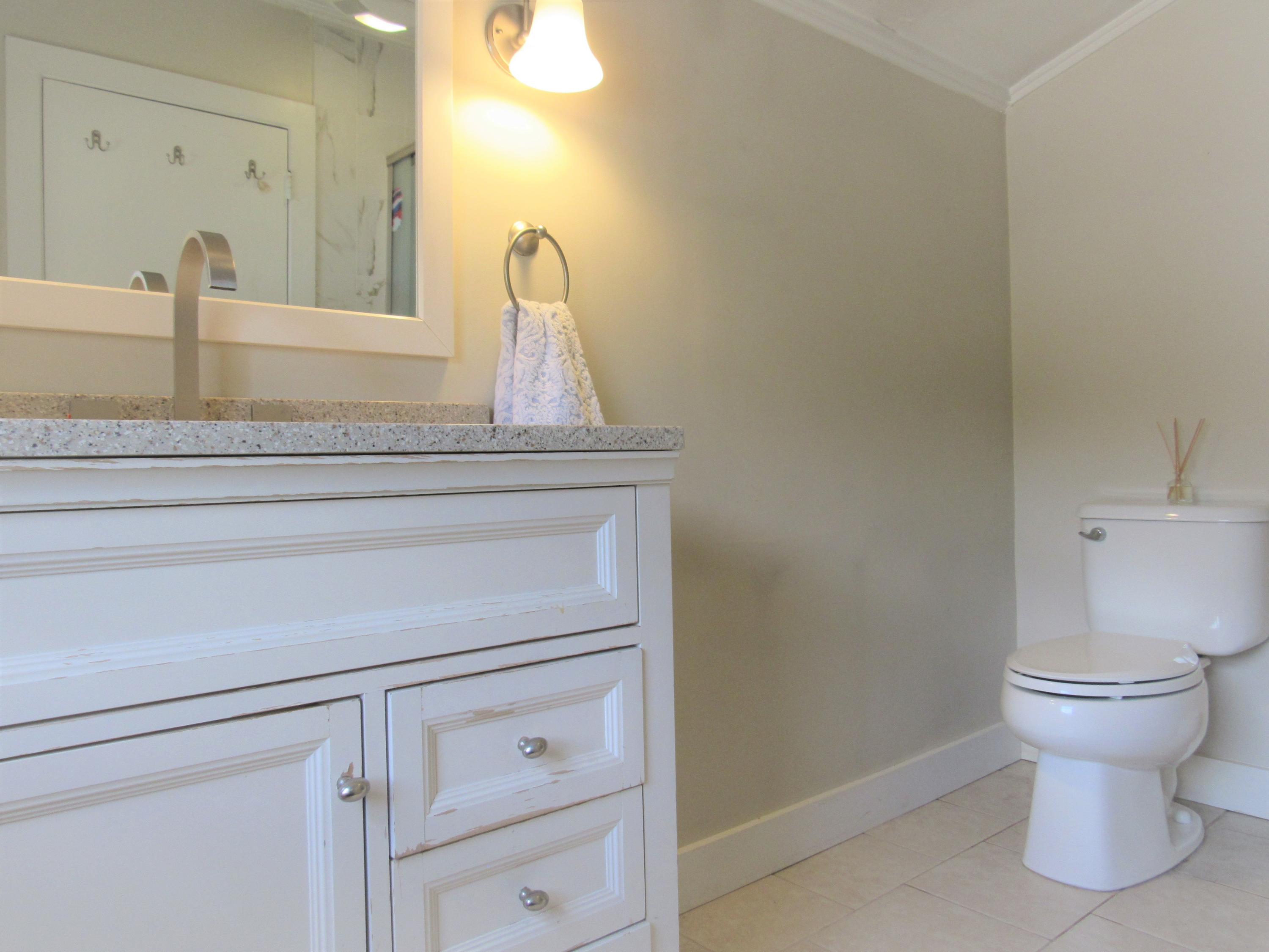 103 Baxter Road Hyannis, MA 02601 - Photo 19 of 31 a bathroom with a toilet and a sink