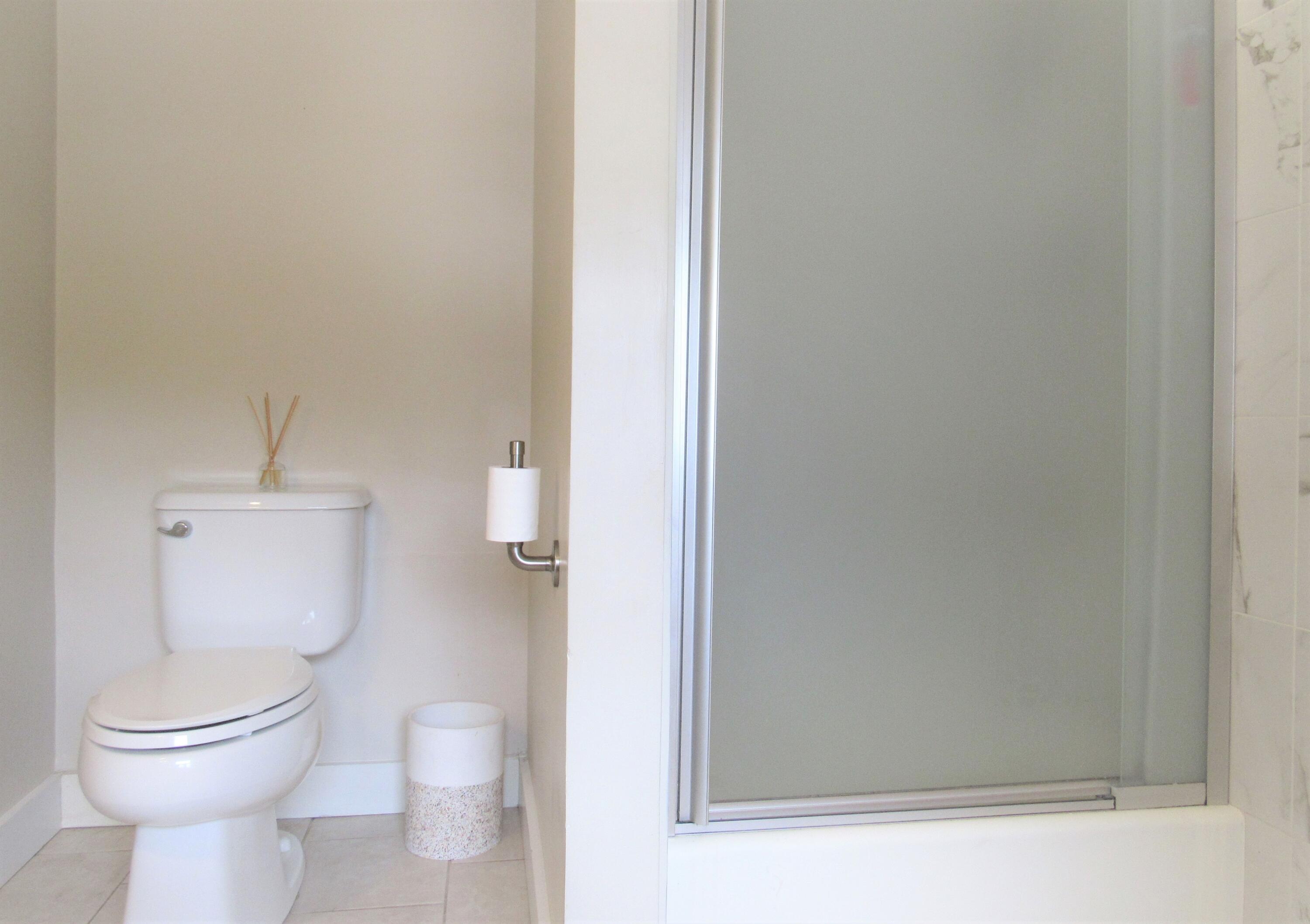 103 Baxter Road Hyannis, MA 02601 - Photo 20 of 31 a white toilet sitting next to a white sink