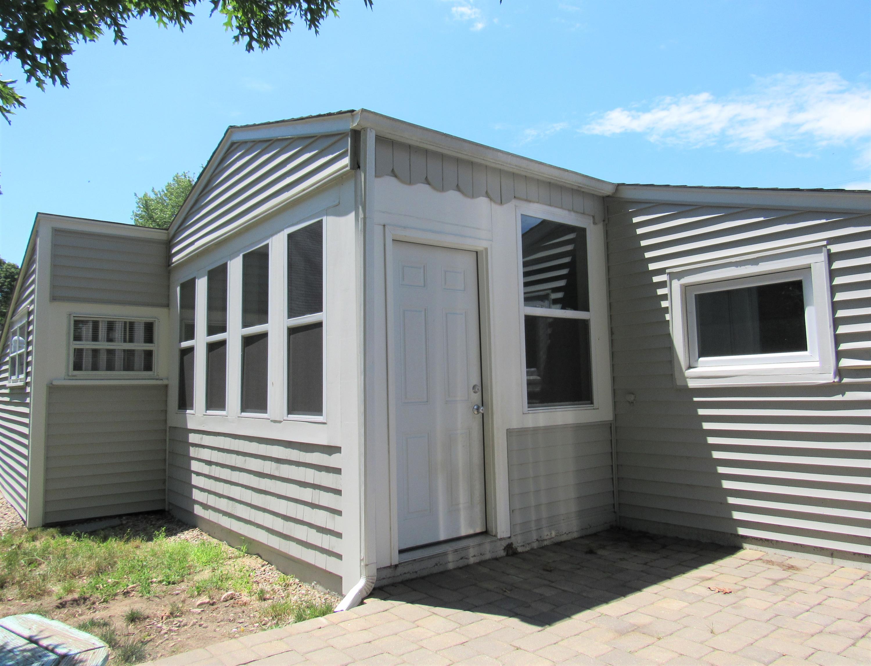 103 Baxter Road Hyannis, MA 02601 - Photo 28 of 31 a front view of a house with a yard