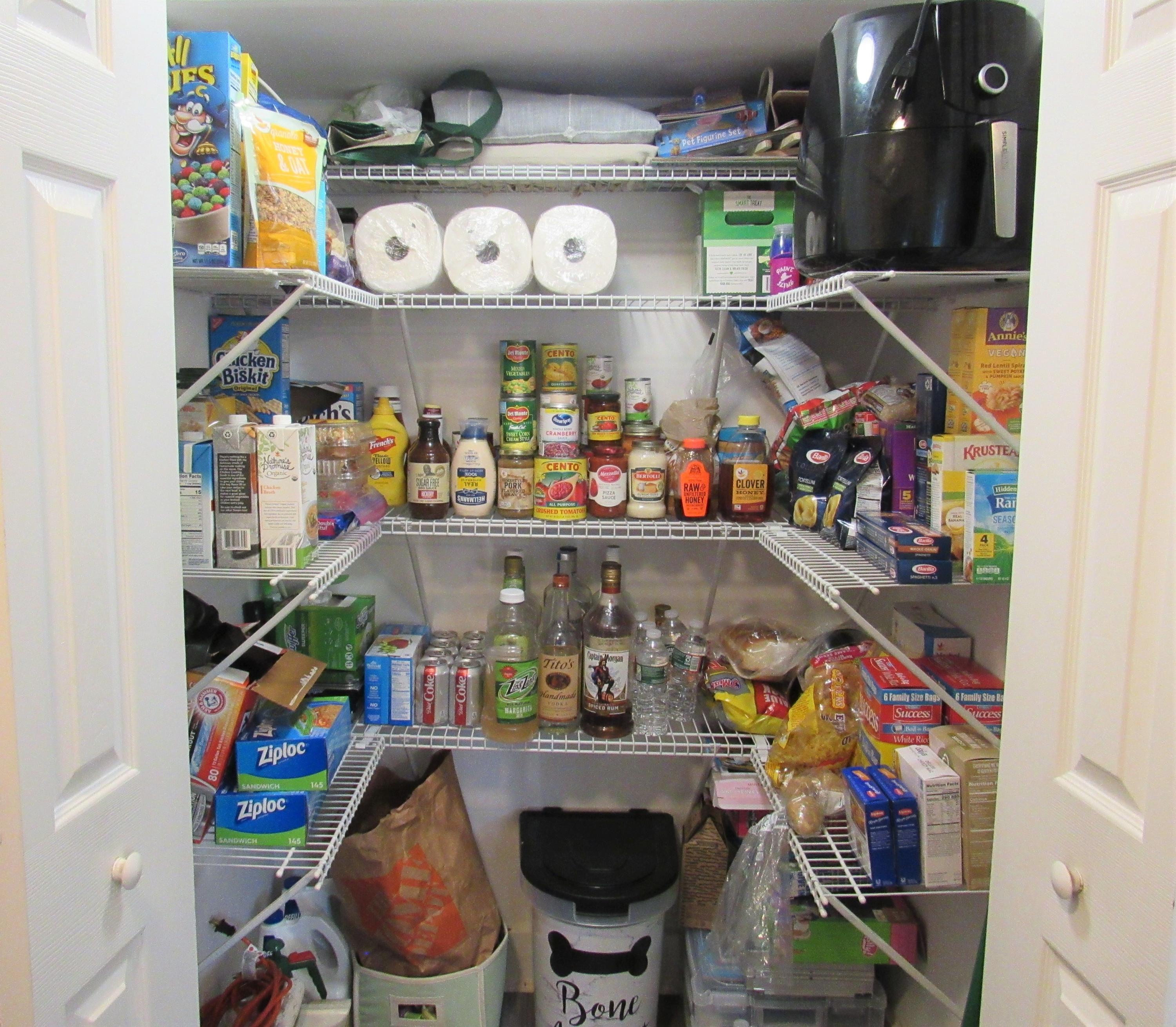 103 Baxter Road Hyannis, MA 02601 - Photo 31 of 31 a store room with lots of clutter and refrigerator
