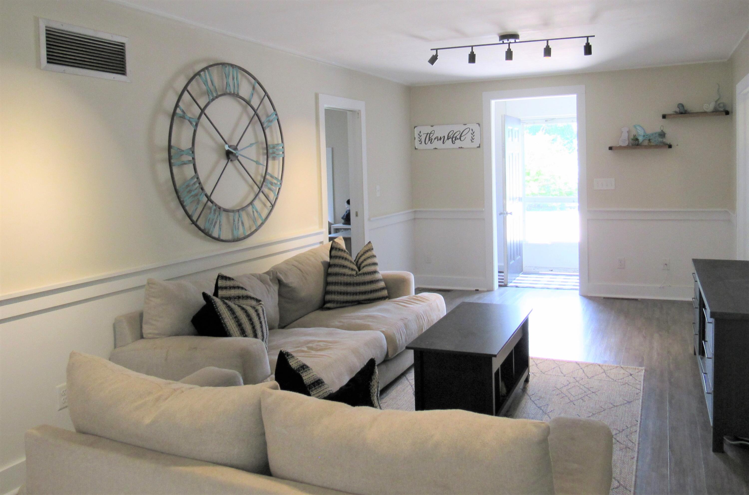103 Baxter Road Hyannis, MA 02601 - Photo 5 of 31 a living room with furniture and a large window
