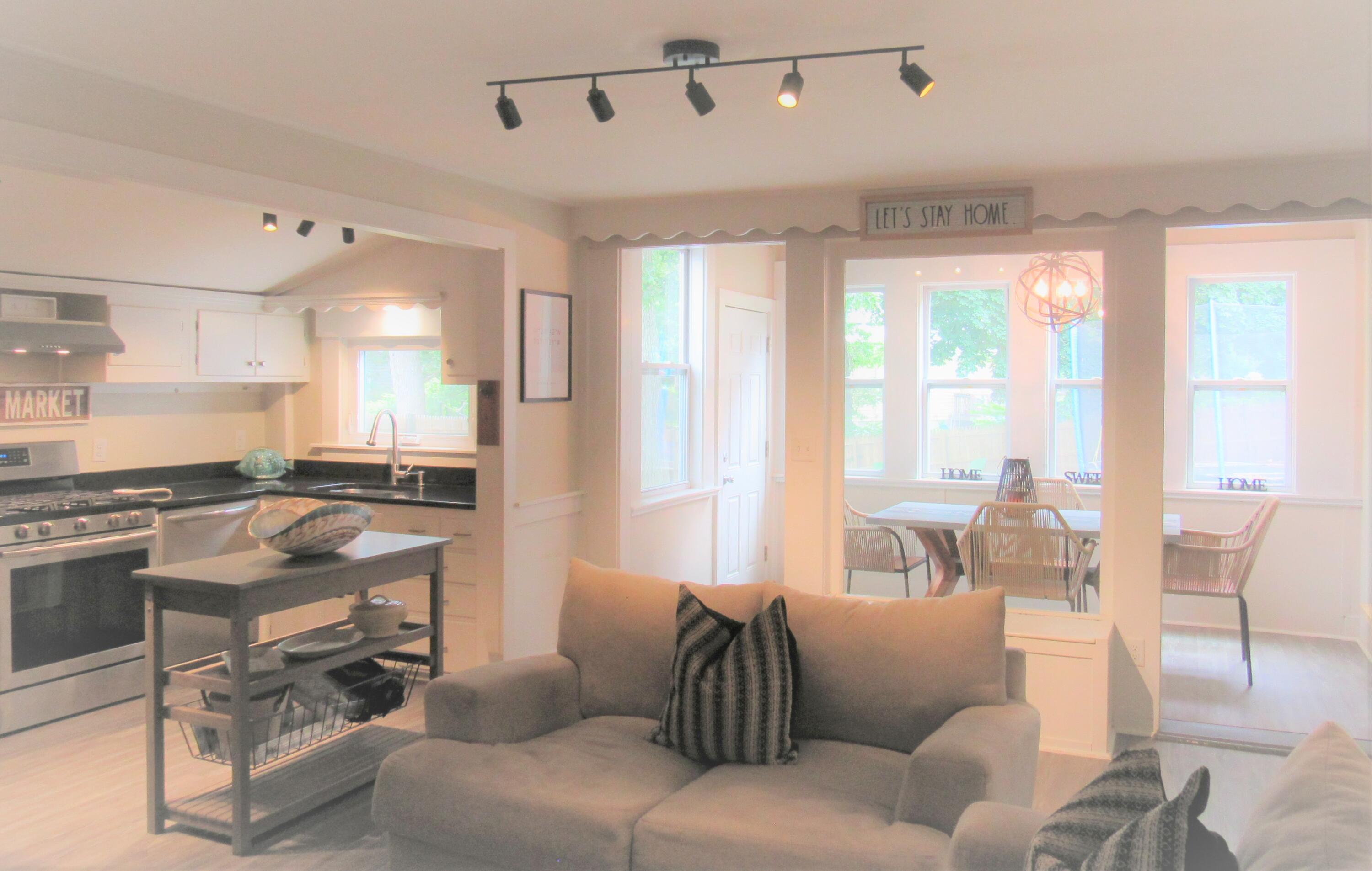 103 Baxter Road Hyannis, MA 02601 - Photo 7 of 31 a living room with furniture and a large window
