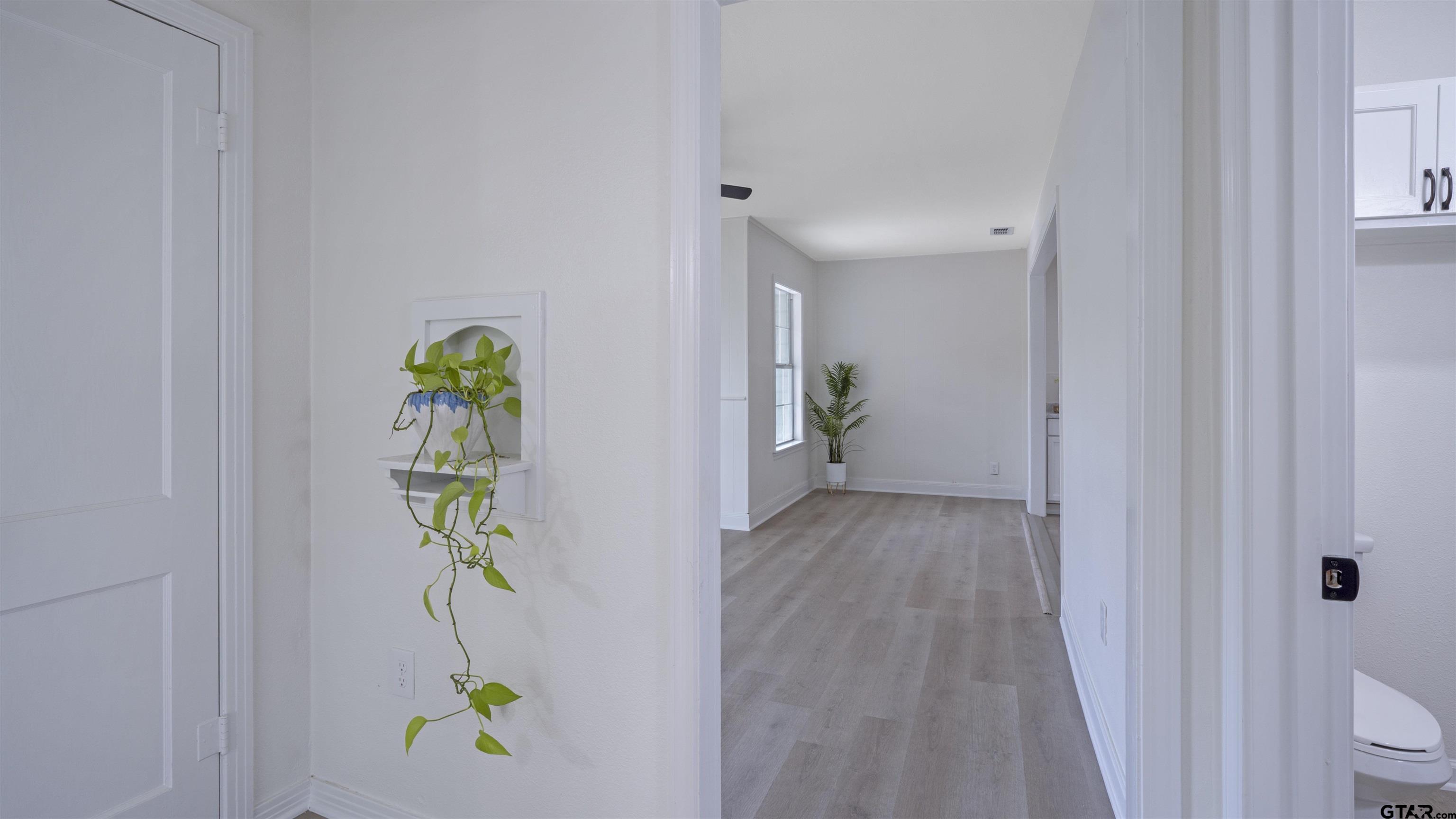 1925 Cushing Drive Tyler, TX 75702 - Photo 14 of 30 a view of an entryway and wooden floor