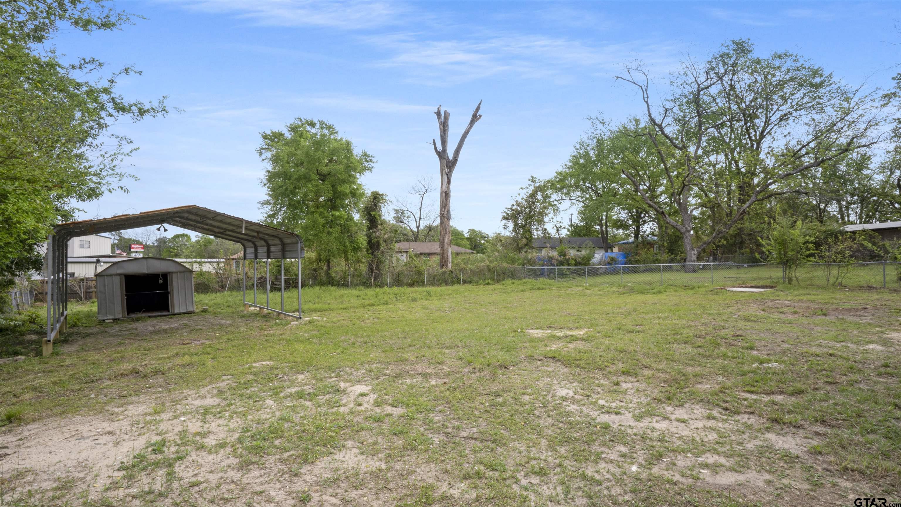 1925 Cushing Drive Tyler, TX 75702 - Photo 30 of 30 a view of open garden with trees