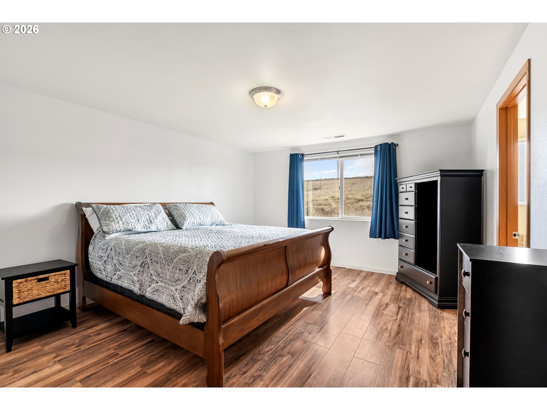 100 Grace Way Goldendale, WA 98620 - Photo 11 of 48 a bedroom with a bed and a large window