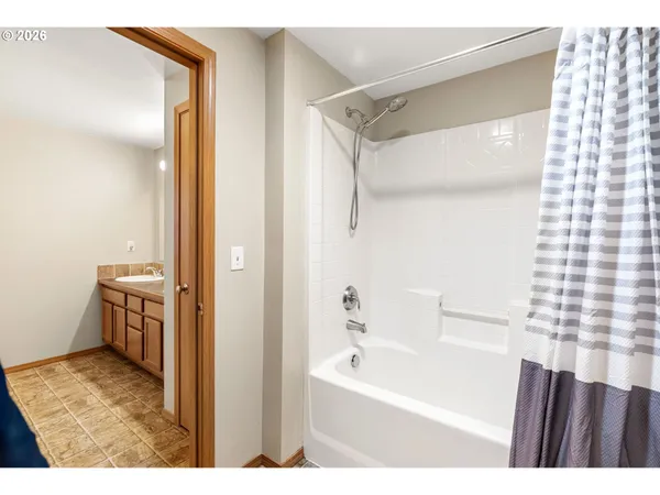 a room with furniture and a wooden floor