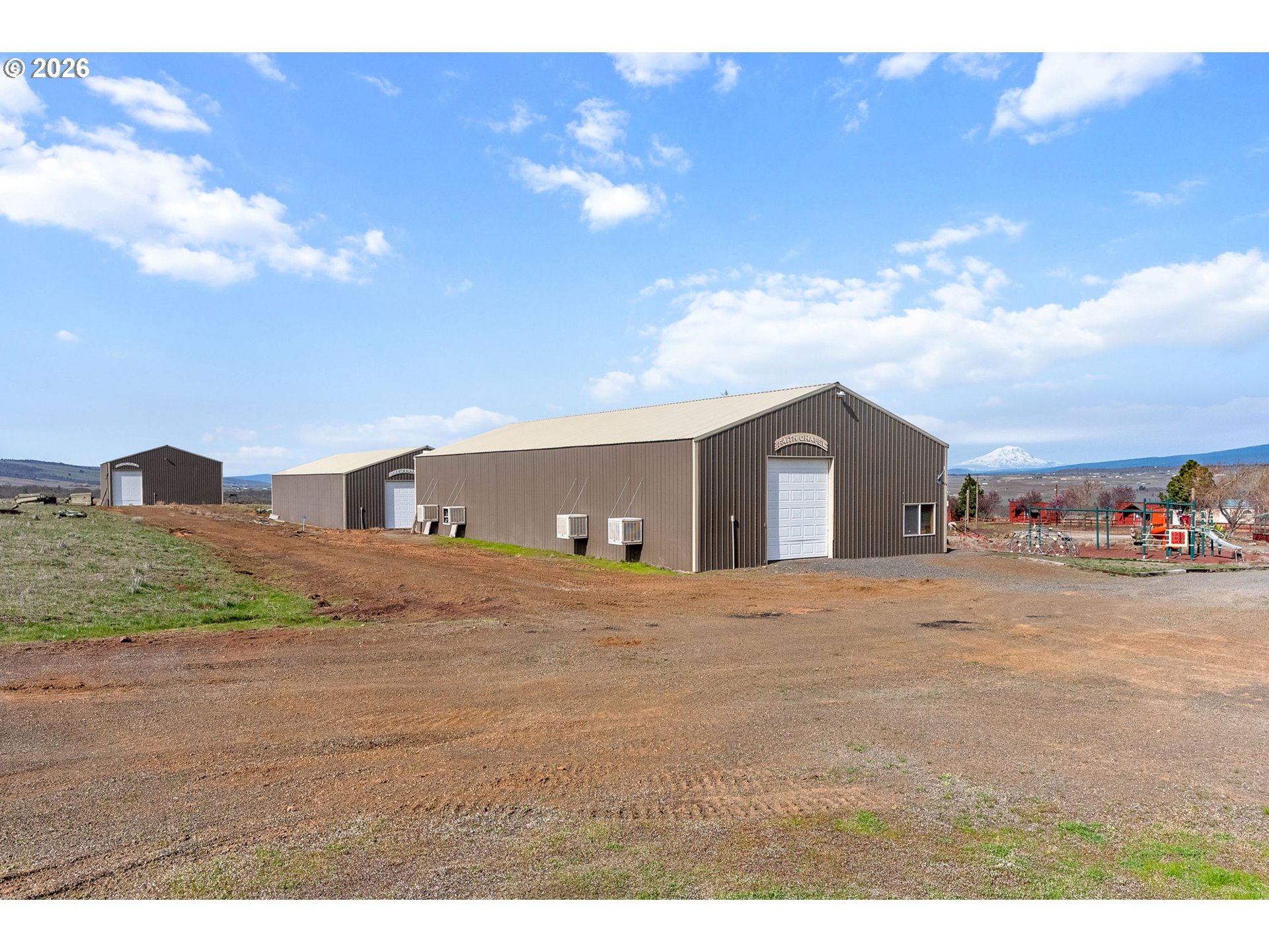 100 Grace Way Goldendale, WA 98620 - Photo 20 of 48 a front view of a house with a yard