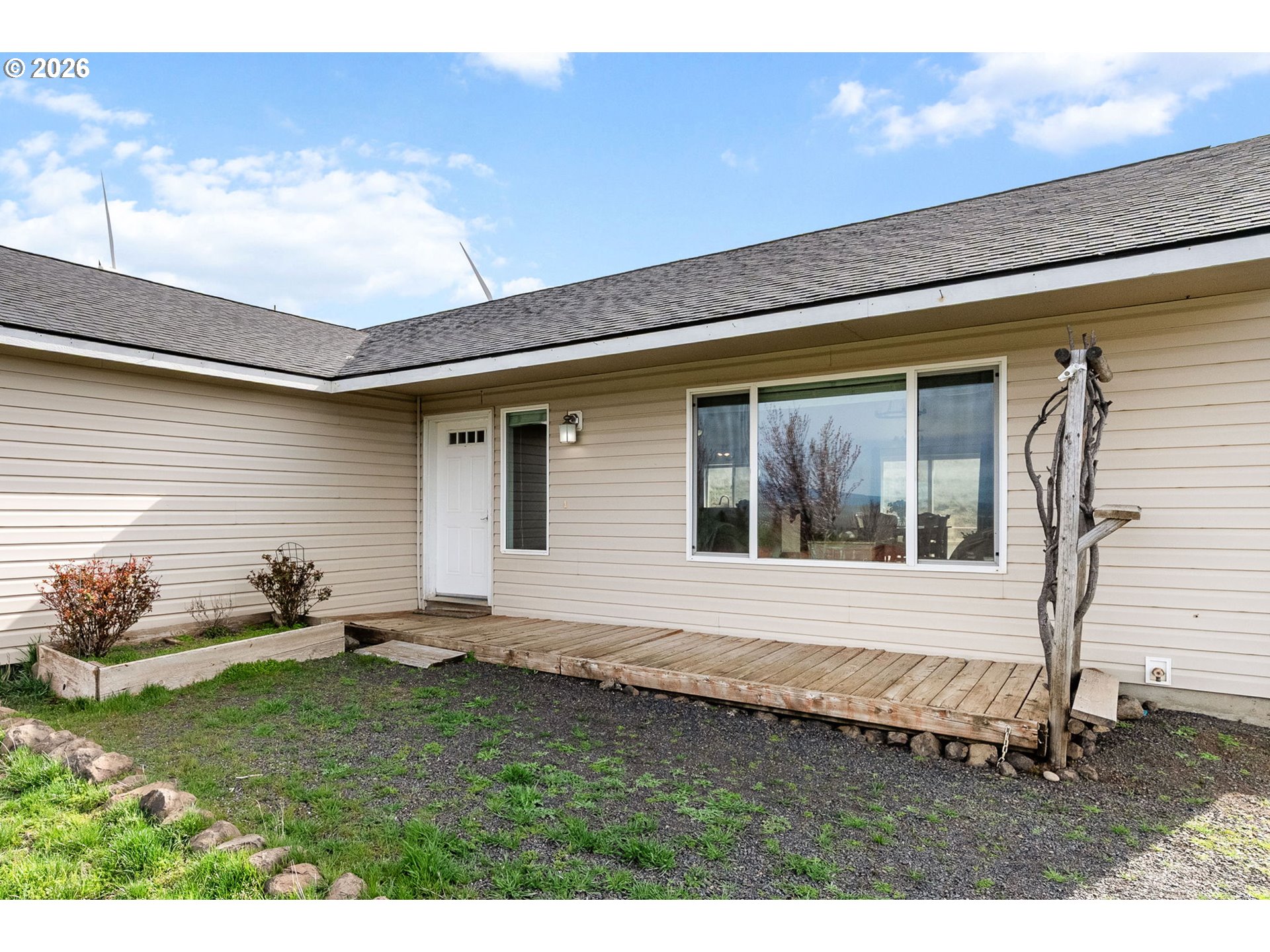 100 Grace Way Goldendale, WA 98620 - Photo 2 of 48 a backyard of a house with table and chairs