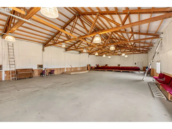 a room with furniture and a chandelier