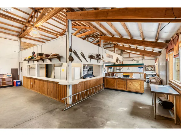 a view of a bathroom with a sink and mirror