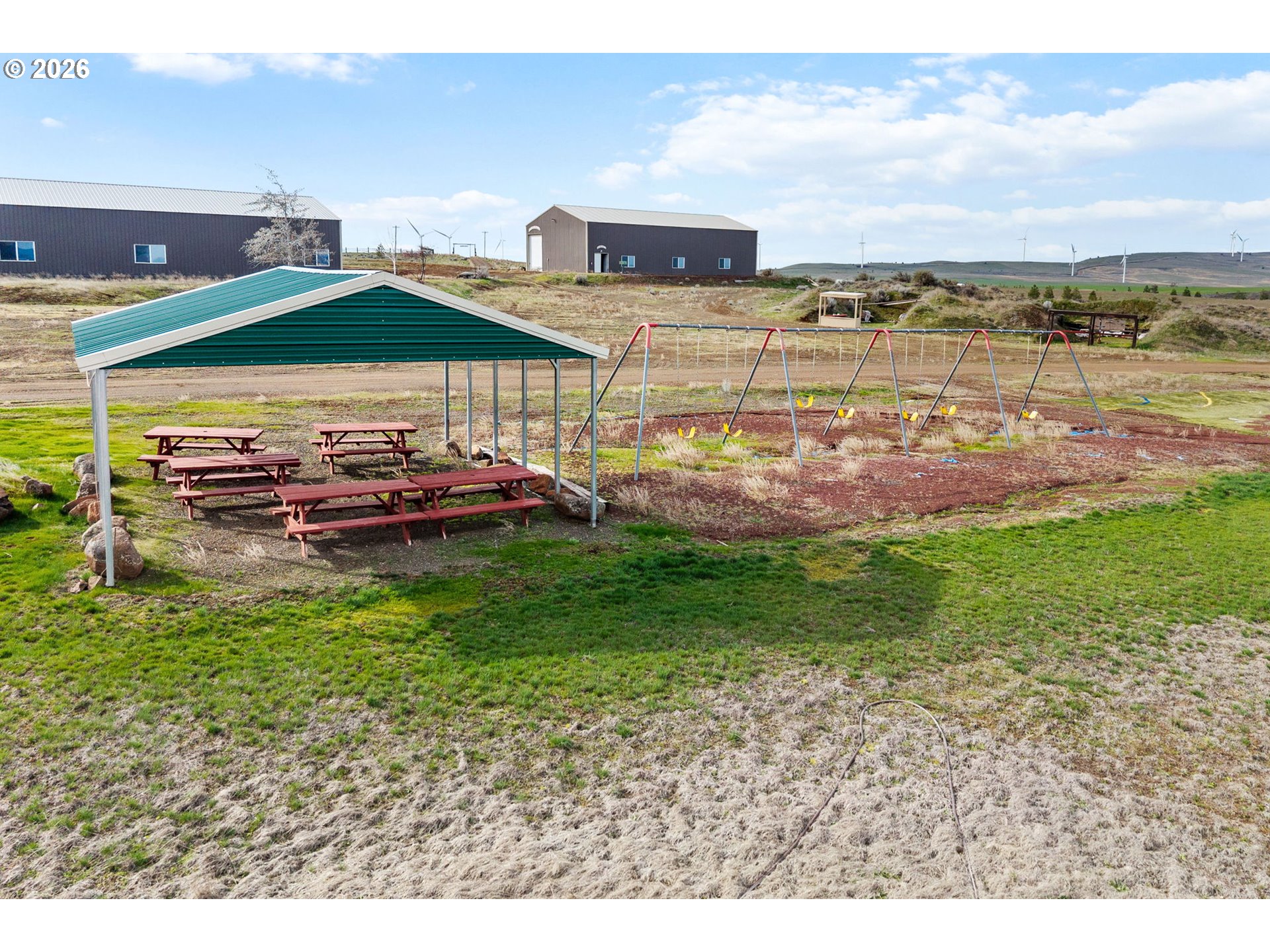 100 Grace Way Goldendale, WA 98620 - Photo 36 of 48 a front view of a house with a garden