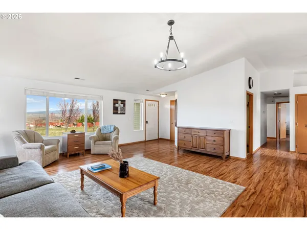 a living room with furniture and a table
