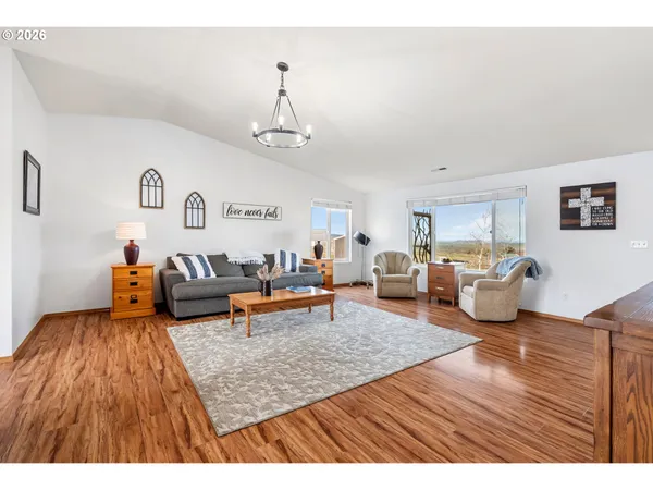 a living room with furniture and a table
