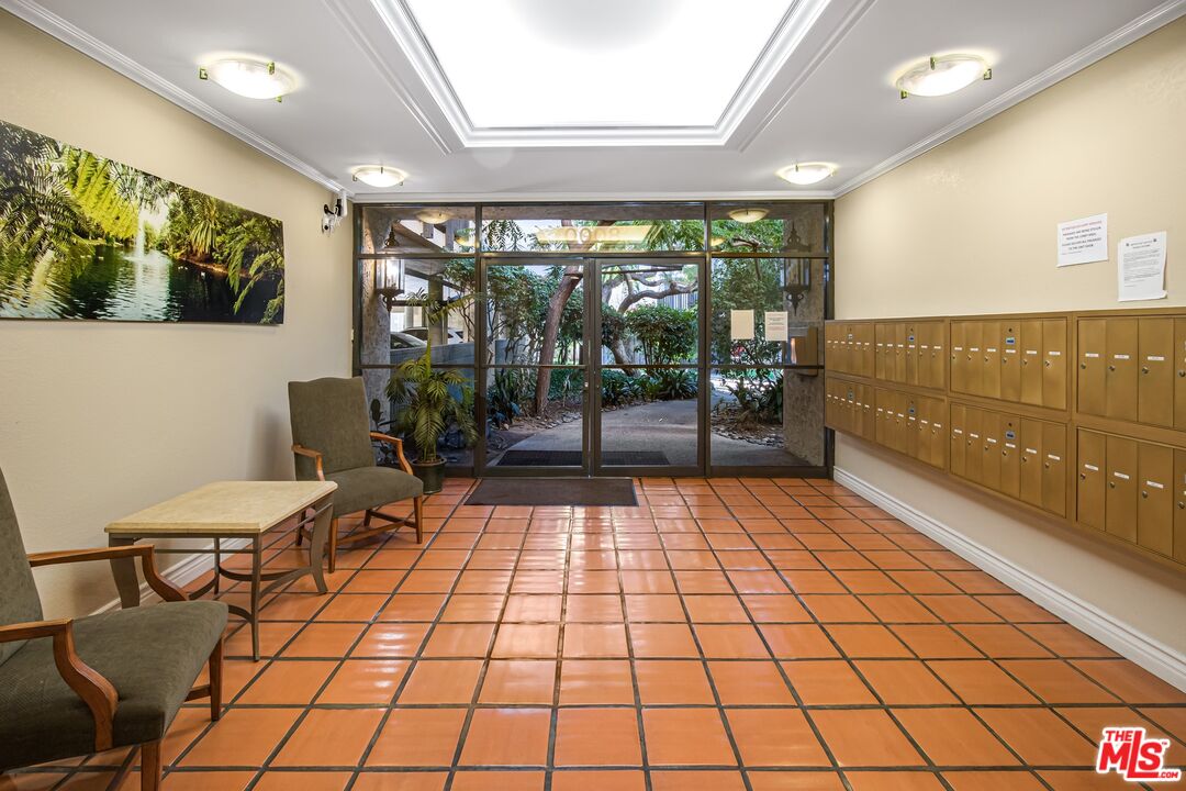 8103 Raintree Circle Culver City, CA 90230 - Photo 2 of 35 a living room with a large window