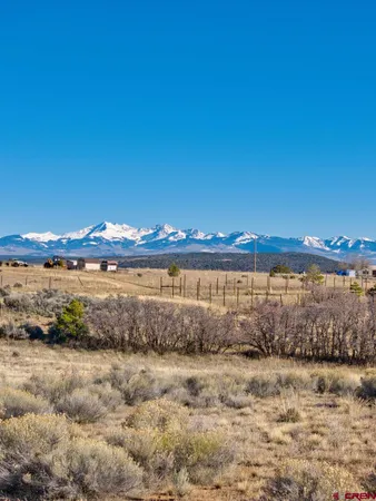 a view of a street with an ocean view