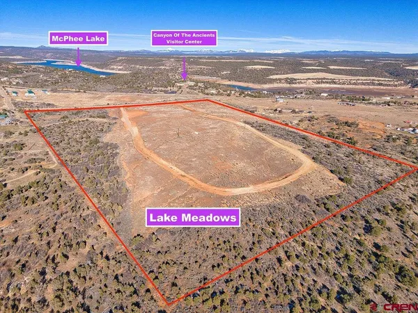 a view of a road with an ocean