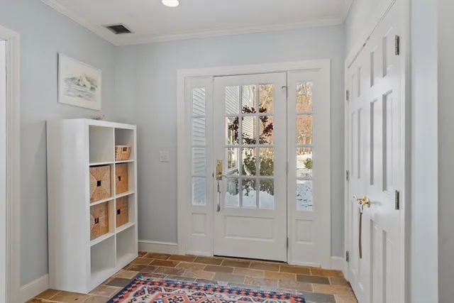 a kitchen with stainless steel appliances granite countertop a sink and cabinets