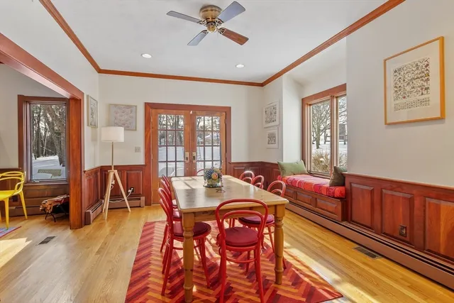 a view of a dining room with furniture window and outside view