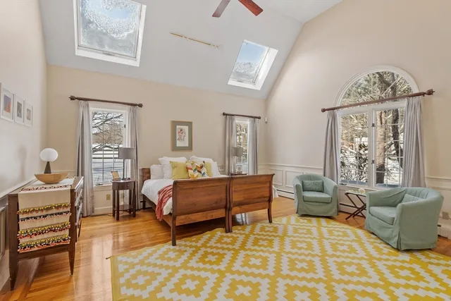 a bedroom with a bed and a cabinets