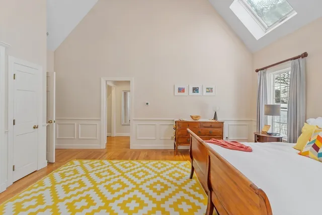 a bathroom with a granite countertop sink mirror and bathtub