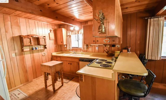 a room with chairs and window