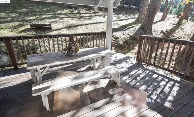 a view of a porch with a bench